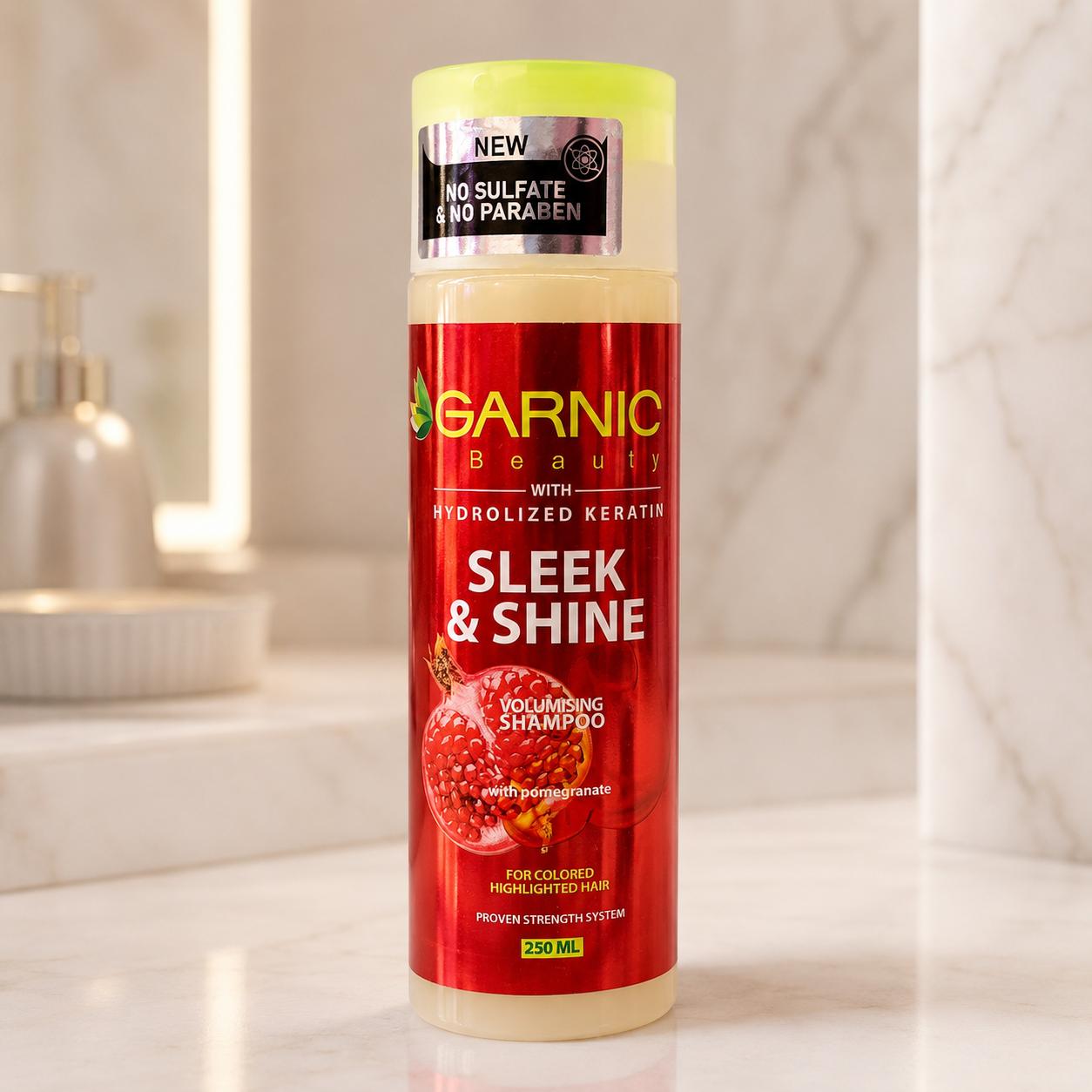 شامپو حجم‌دهنده مو مناسب موهای رنگ‌شده حاوی عصاره انار و کراتین هیدرولیز شده250ml Sleek & Shine