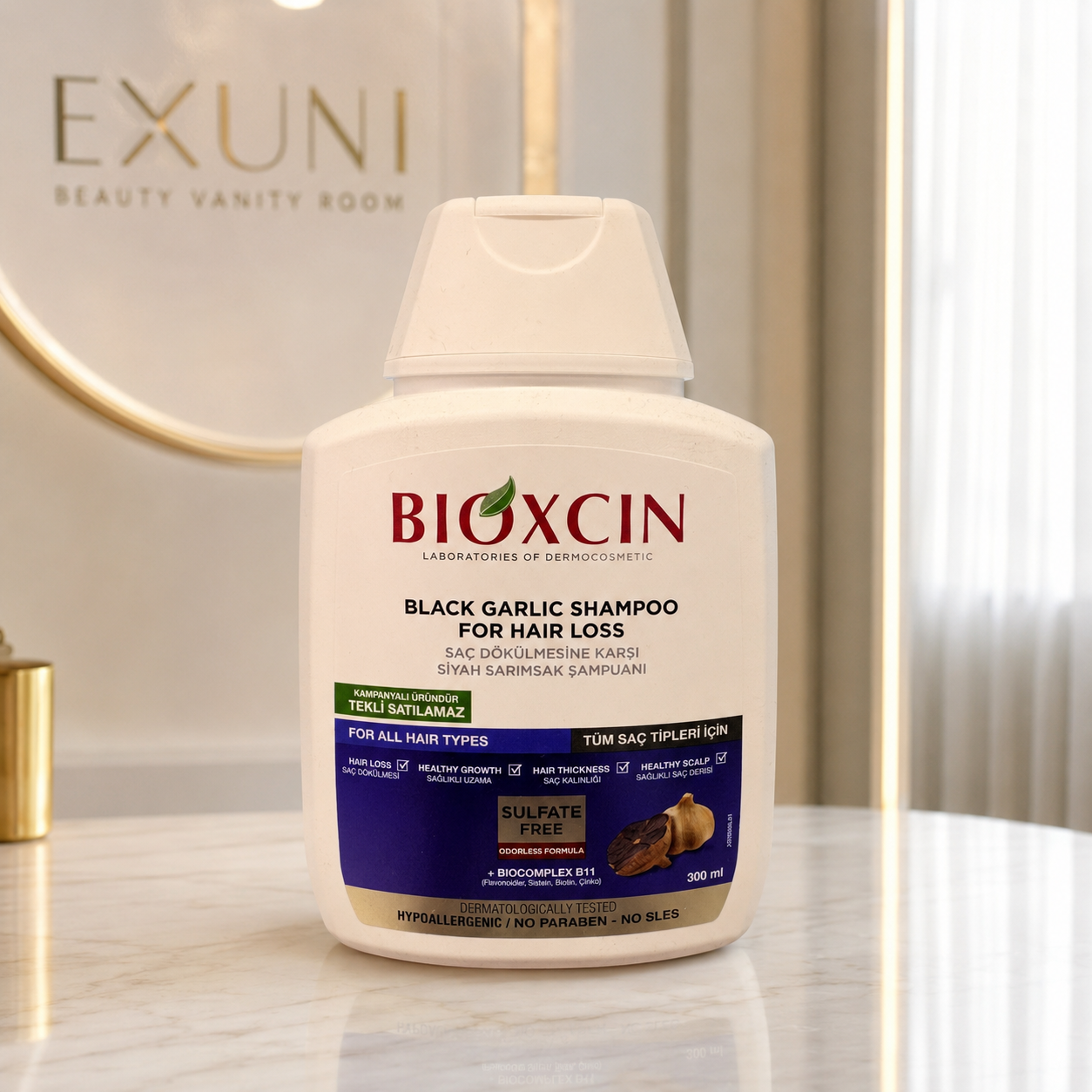 شامپو ضدریزش بیوکسین حاوی سیر سیاه و300ml (Black Garlic) BIOCOMPLEX B11